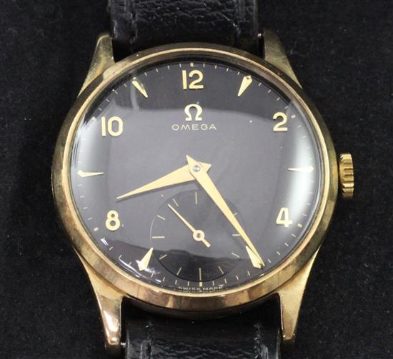 A gentlemans 1950s 9ct gold Omega manual wind wrist watch, with original Omega box.